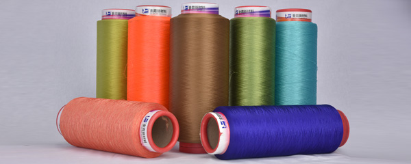 What are the benefits of colored polyester low stretch yarn?